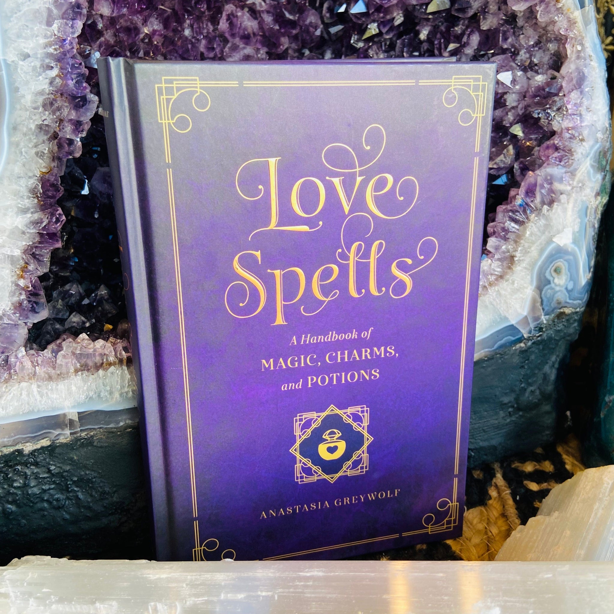 Love Spells: A Handbook of Magic, Charms, and Potions by Anastasia